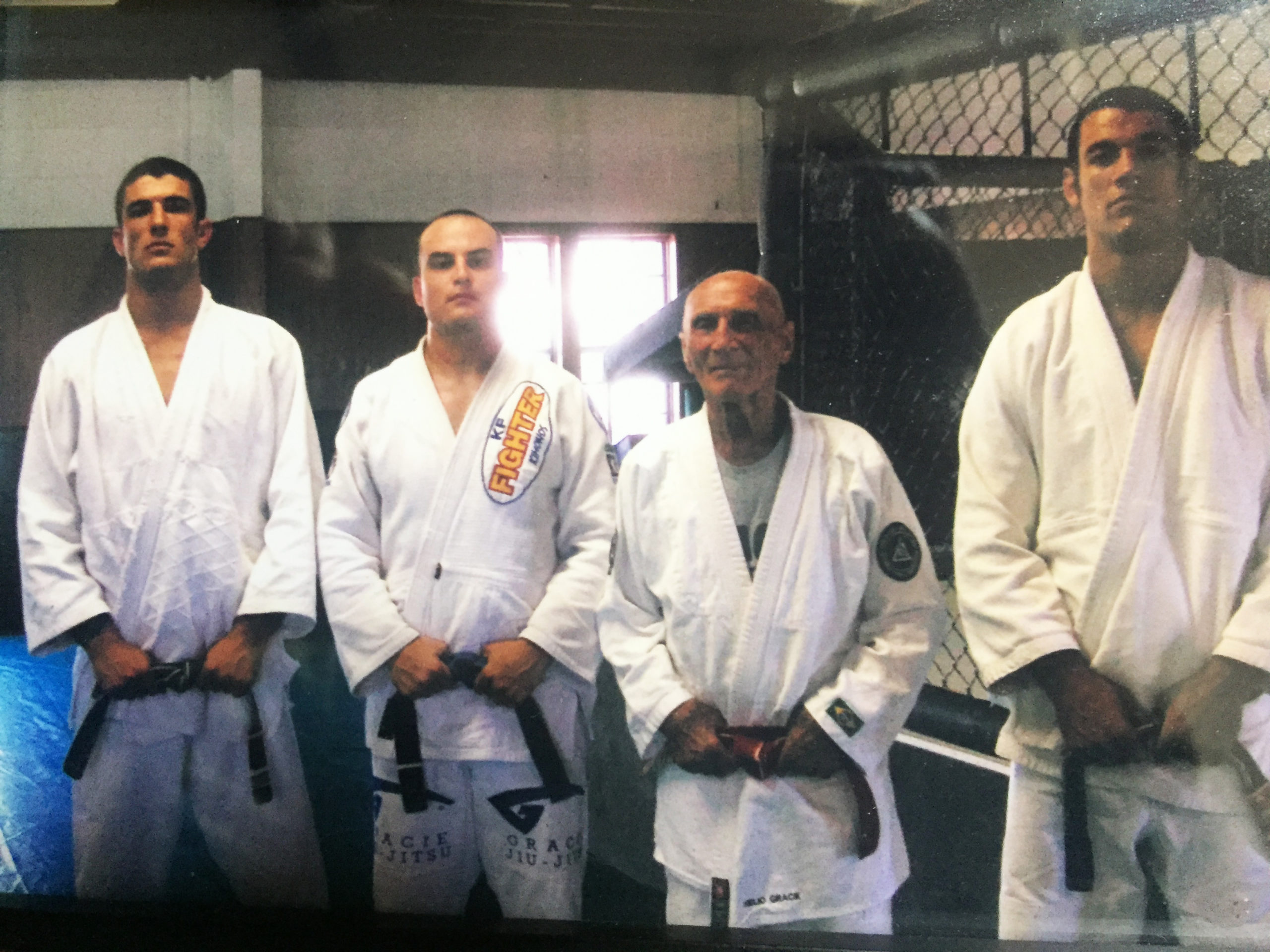 Matt Altschul (center) with Rener (left), Grandmaster Helio (right), and Ryron Gracie 
